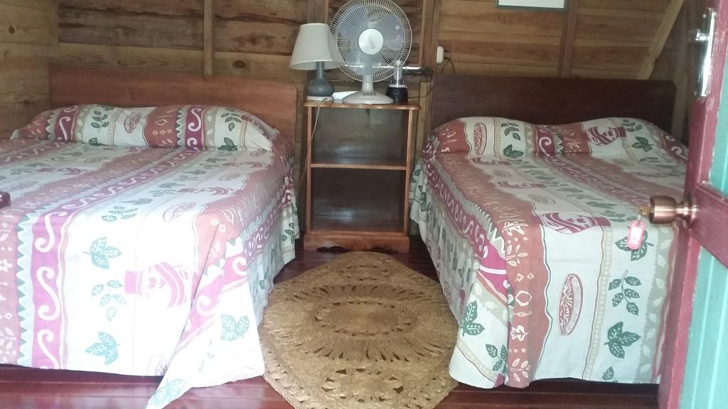 Secret Cabins At Firefly Beach Cottage Негрил Номер фото